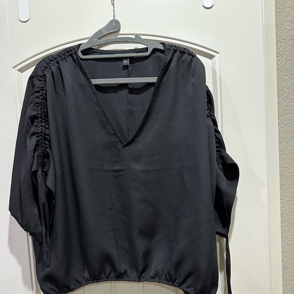 Express V Neck 3/4 sleeve shirt.